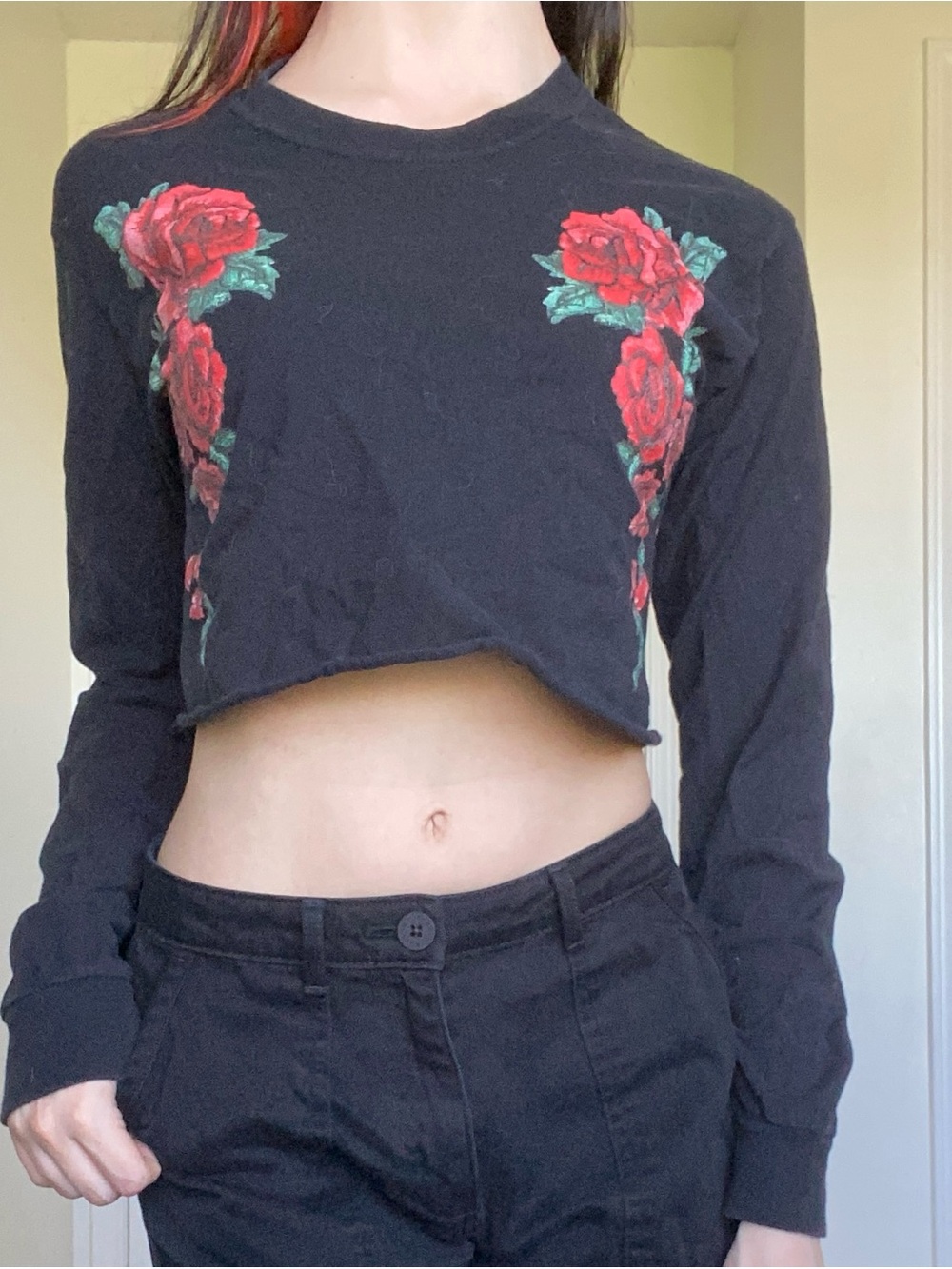 Black long sleeve crop top with red rose design
